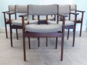 A set of six mid 20thC fruitwood framed dining chairs, each with a fabric upholstered back and seat,