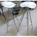 A pair of modern chromium framed bar stools