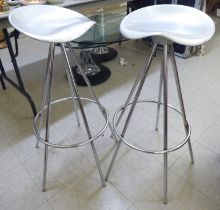 A pair of modern chromium framed bar stools