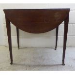A George III string inlaid mahogany Pembroke table, raised on square, tapered legs and casters  28"h