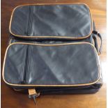 A Bugatti two tone hide suit carrier