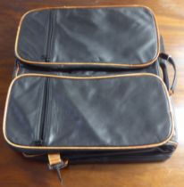 A Bugatti two tone hide suit carrier