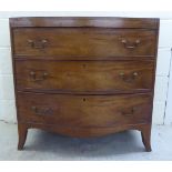 A mid 19thC mahogany bow front, three drawer dressing chest, raised on splayed legs  36"h  36"w
