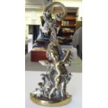 A Victorian style cast brass door porter, fashioned as a cherubic figure with fruiting vine ornament