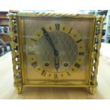 A Luxor lacquered brass cased mantel clock; the 8 day movement faced by a Roman dial  7.5"h  8.5"w