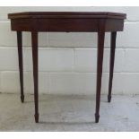 A late 19thC mahogany card table, raised on square, tapered legs and spade feet  29"h  32"w  opening