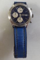 A Breitling stainless steel chronograph cased wristwatch, model no.A13023/1271, faced by a baton