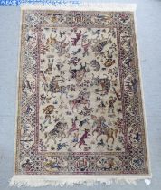 A Persian rug, decorated with huntsmen on foot and horseback, on a stone coloured ground  53" x 36"