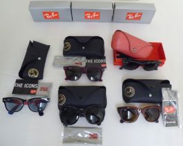 Five pairs of designer sunglasses  four cased