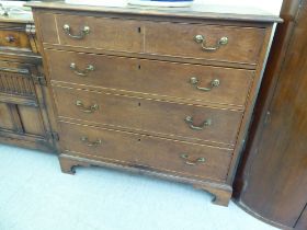 An early 20thC oak four drawer dressing chest, raised on bracket feet  36"h  38"w