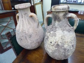 Two antique twin handled, stoneware vessels of ovoid form  20"h