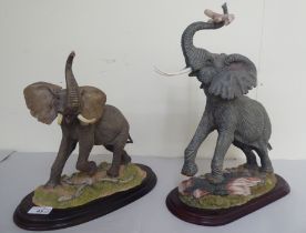 Two similar composition model elephants  12" and 5"h