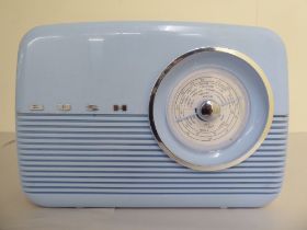 A vintage powder blue coloured plastic cased Bush radio