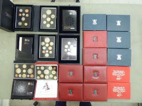 An uncollated collection of British proof coin sets, mainly boxed: to include Glimpses of the