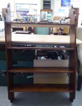 An early 20thC waxed and stained pine four tier hanging bookcase  46"h  29"w