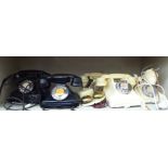 Vintage telephone handsets: to include three ivory coloured plastic/Bakelite cased examples with