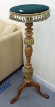 An early 20thC grey painted hardwood torchere with a turned column, raised on a tripod base  40"h