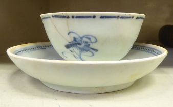 A Tek-Sing treasures porcelain tea bowl and saucer  bears a Nagel Auctions label