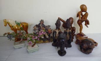 A mixed lot: to include carved wooden figures  largest 16"h