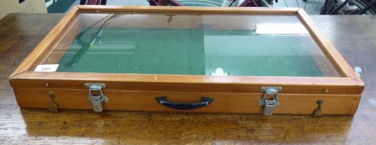 A modern pine trader's table-top display case with a glazed, hinged lid  3"h  24"w  12" deep