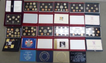 An uncollated collection of British proof coin sets, mainly boxed: to include Glimpses of the