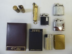 Various petrol filled cigarette lighters: to include a Zippo and a Camel