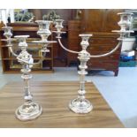 A pair of 20thC silver plated twin branch candelabra  15"h  17"w
