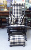 A late 19thC American mahogany framed rocking chair with a spindled crest and an upholstered back