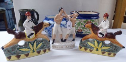 A mixed lot: to include a reproduction of a late 19thC Staffordshire pottery group 'Heenan