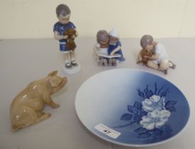 Royal Copenhagen porcelain collectables: to include a figure of a young boy holding a puppy  5"h