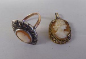 A 9ct gold and silver cameo ring; and a yellow metal cameo pendant