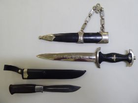 Daggers: to include a German example with an embellished blade  8.5"L in a scabbard