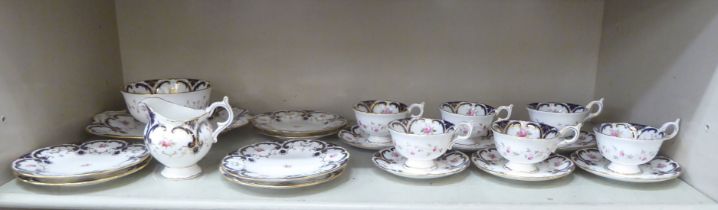 A Coalport china tea set, decorated with flora