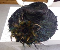 A lady's flamboyant feather hat  boxed