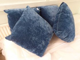 Four blue scatter cushions