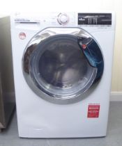 A Hoover H-Wash & Dry 300 washing machine  33"h  23"w