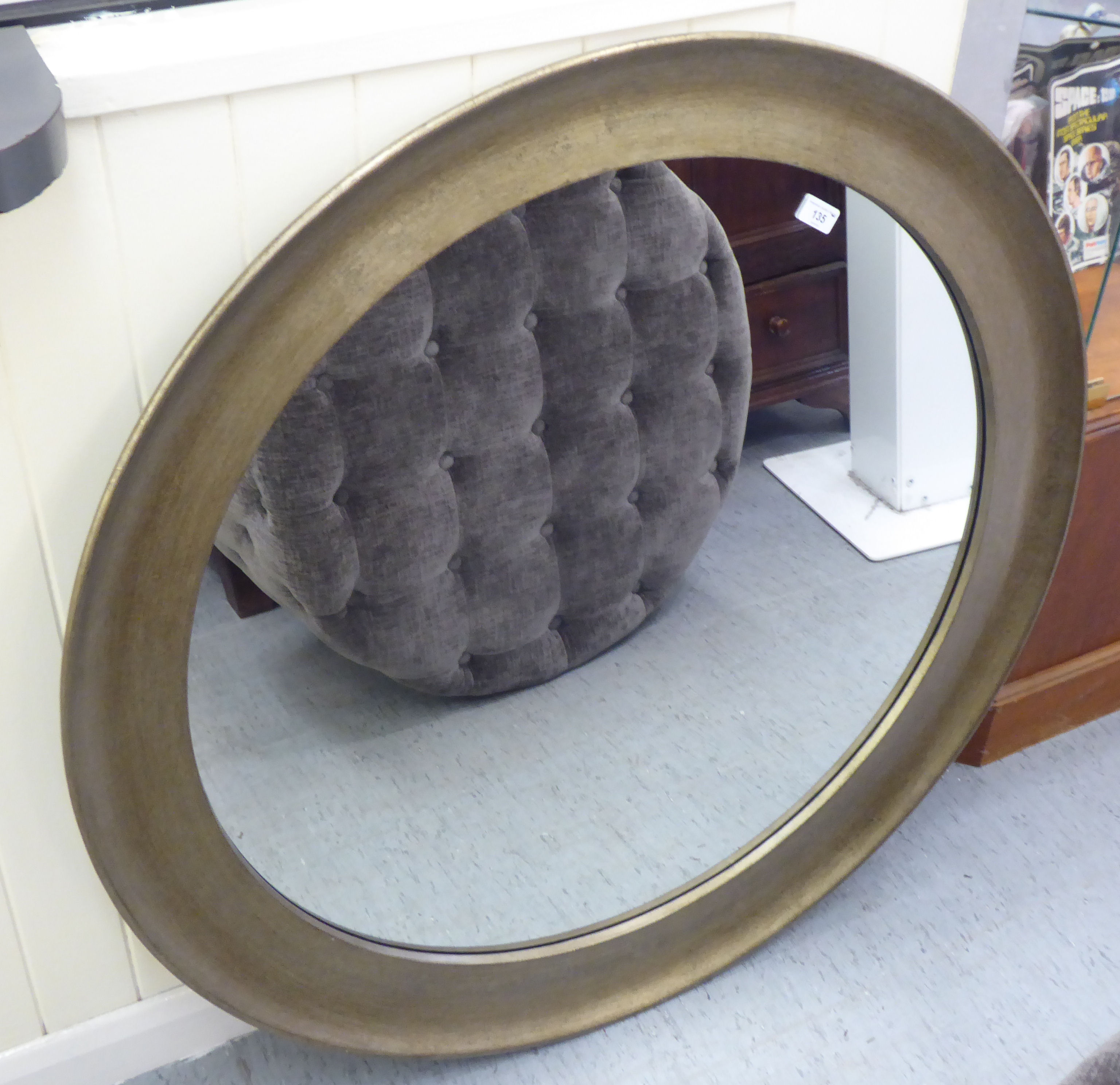 An RV Astley mirror, set in a wide, gilded frame  39"dia