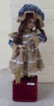 A Rosenburg porcelain automaton doll  19"h