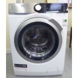 An AEG 9000 Series Lavamat washing machine  38.5"h  23.5"w