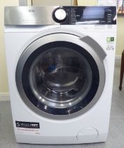An AEG 9000 Series Lavamat washing machine  38.5"h  23.5"w