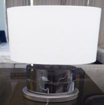 A modern twin branch stainless steel table light and shade  17"h