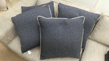 Four blue scatter cushions