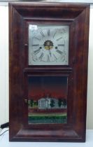 An early/mid 20thC American walnut effect and glazed cased wall clock; the movement faced by a Roman