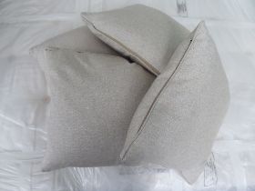 A set of four silver/cream coloured scatter cushions