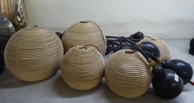 Interior lighting: to include tubular metal examples; and wicker bound hanging lights  various sizes