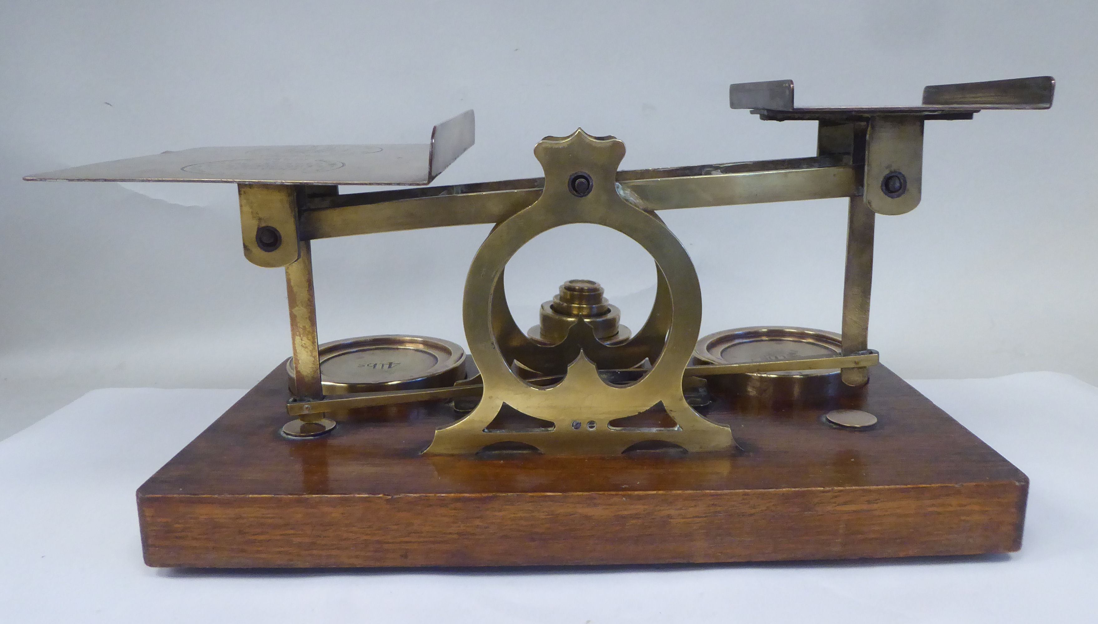 Late Victorian S.Mordan & Co, London, lacquered brass beam balance postal scales, attached to an oak - Image 8 of 9