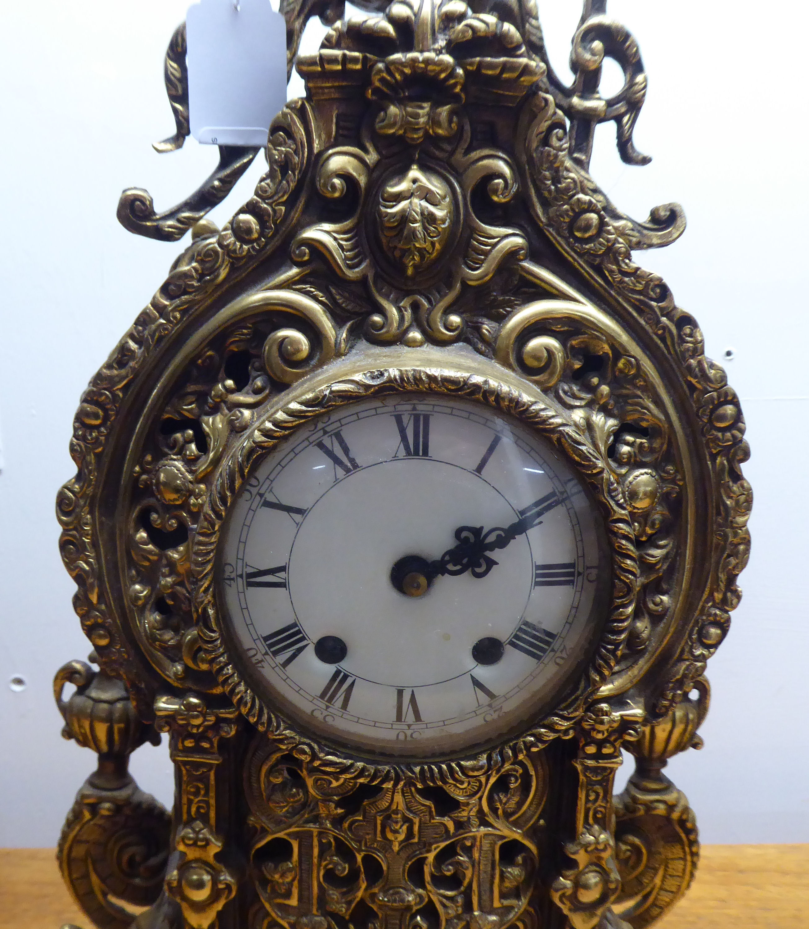 A mid 20thC mantel clock, the brass case profusely decorated in Empire style; the 8 day movement - Image 3 of 14