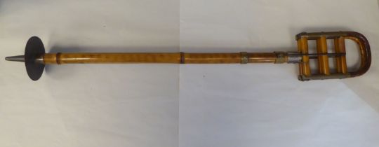 An Edwardian bamboo shooting stick with brass and steel mounts