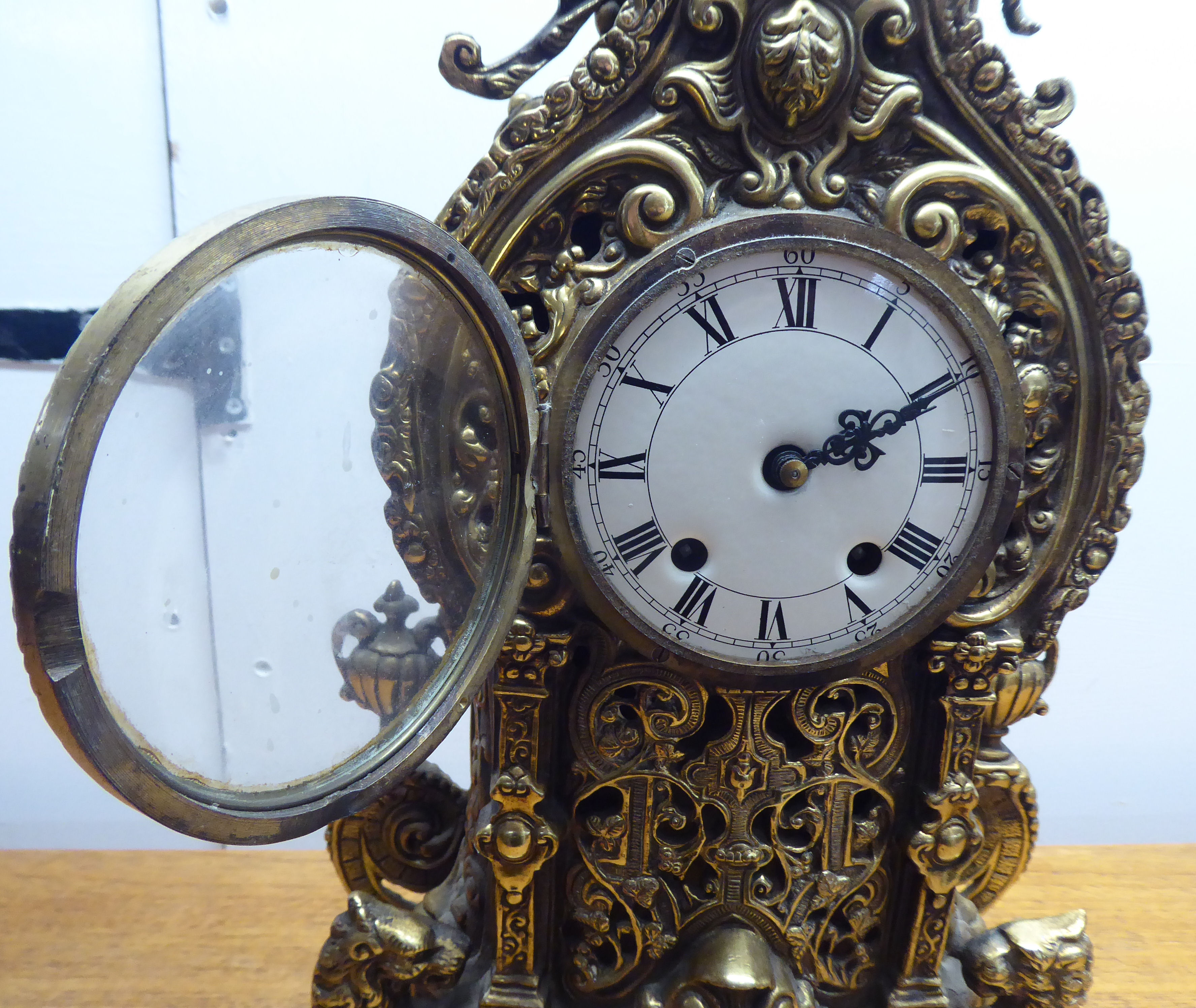 A mid 20thC mantel clock, the brass case profusely decorated in Empire style; the 8 day movement - Image 9 of 14