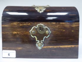 A late 19thC coromandel veneered jewellery casket with straight sides, a lockable, hinged, domed lid